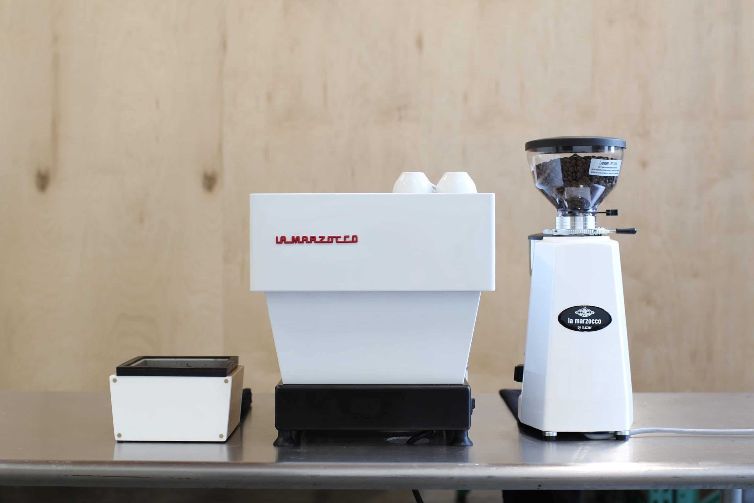 barista pro kit including espresso machine, grinder, knock box