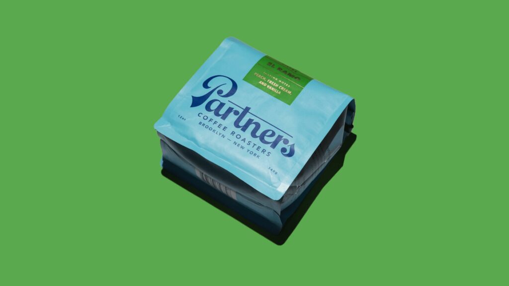 Partners Coffee Roasters specialty coffee bag on green background