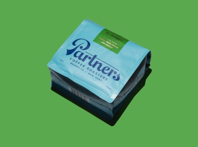 Partners Coffee Roasters specialty coffee bag on green background