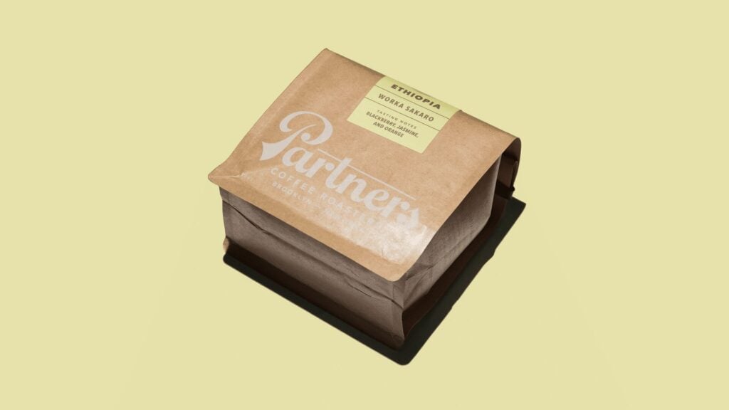 Partner coffee bag packaging on a yellow background