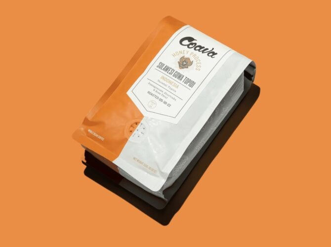 Cody smoked stout topper, specialty coffee packaging on orange background
