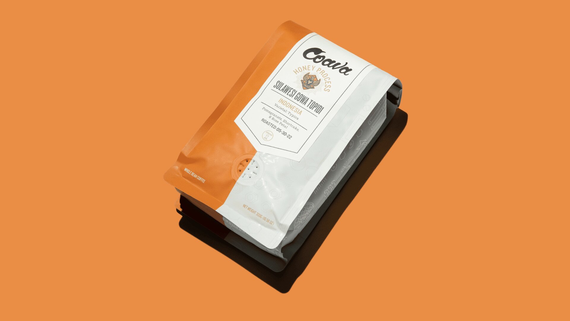 Cody smoked stout topper, specialty coffee packaging on orange background