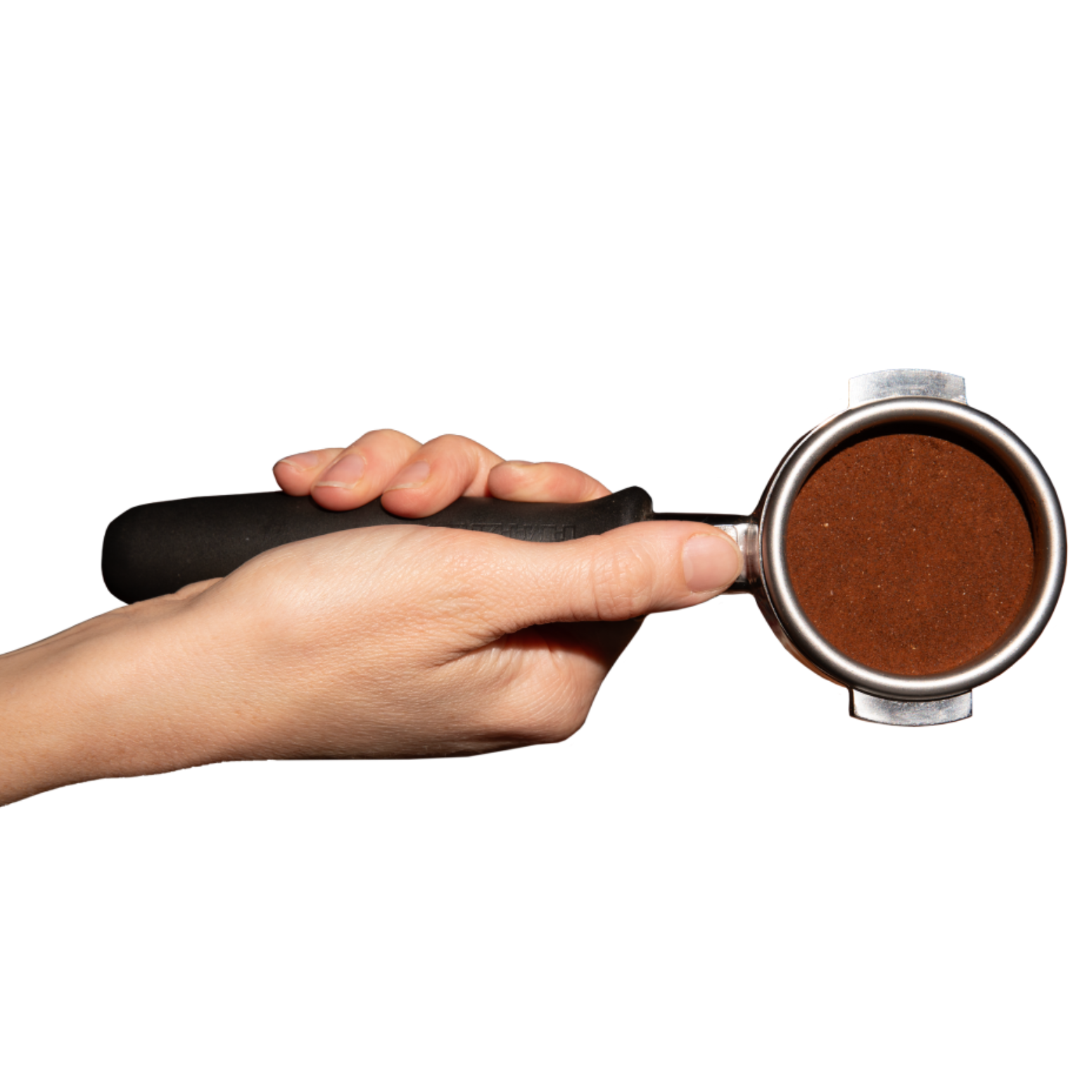 Portafilter in hand, with ground coffee