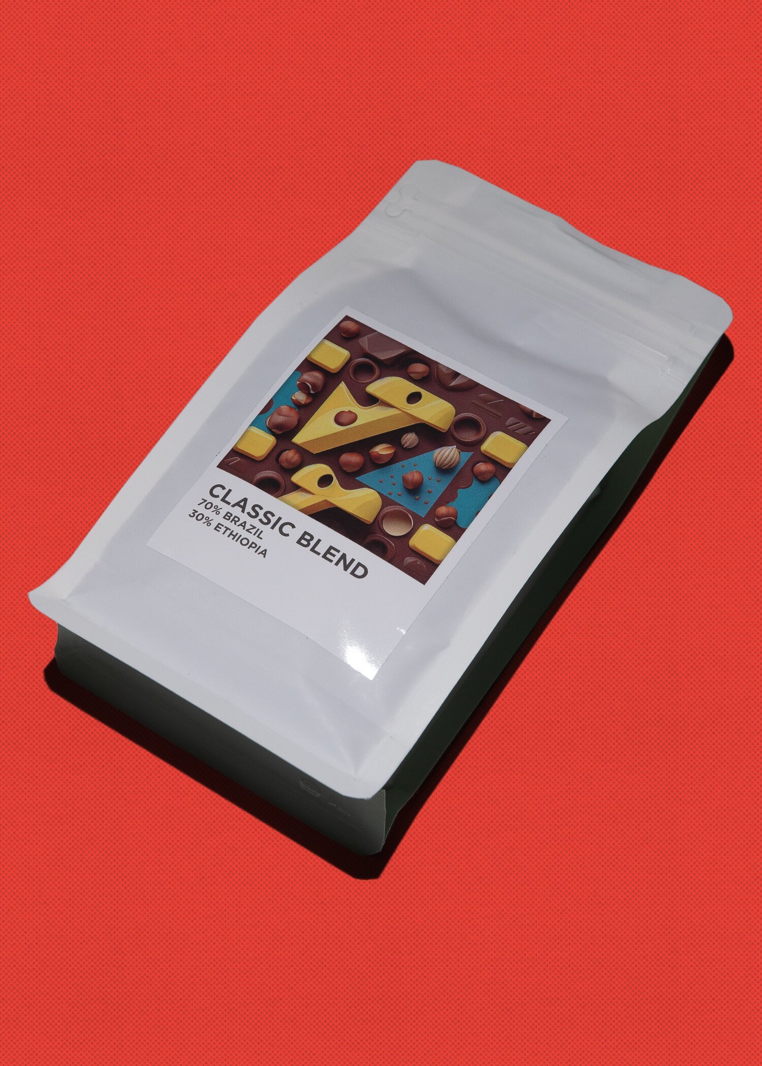 Accademia Coffees Classic Blend package, 300g Ethiopia single-origin coffee, against red background