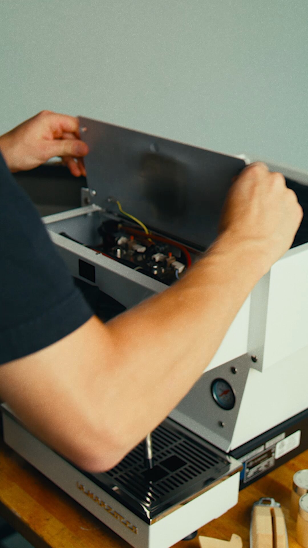 La Marzocco Linea Mini espresso machine internal components being installed during customization