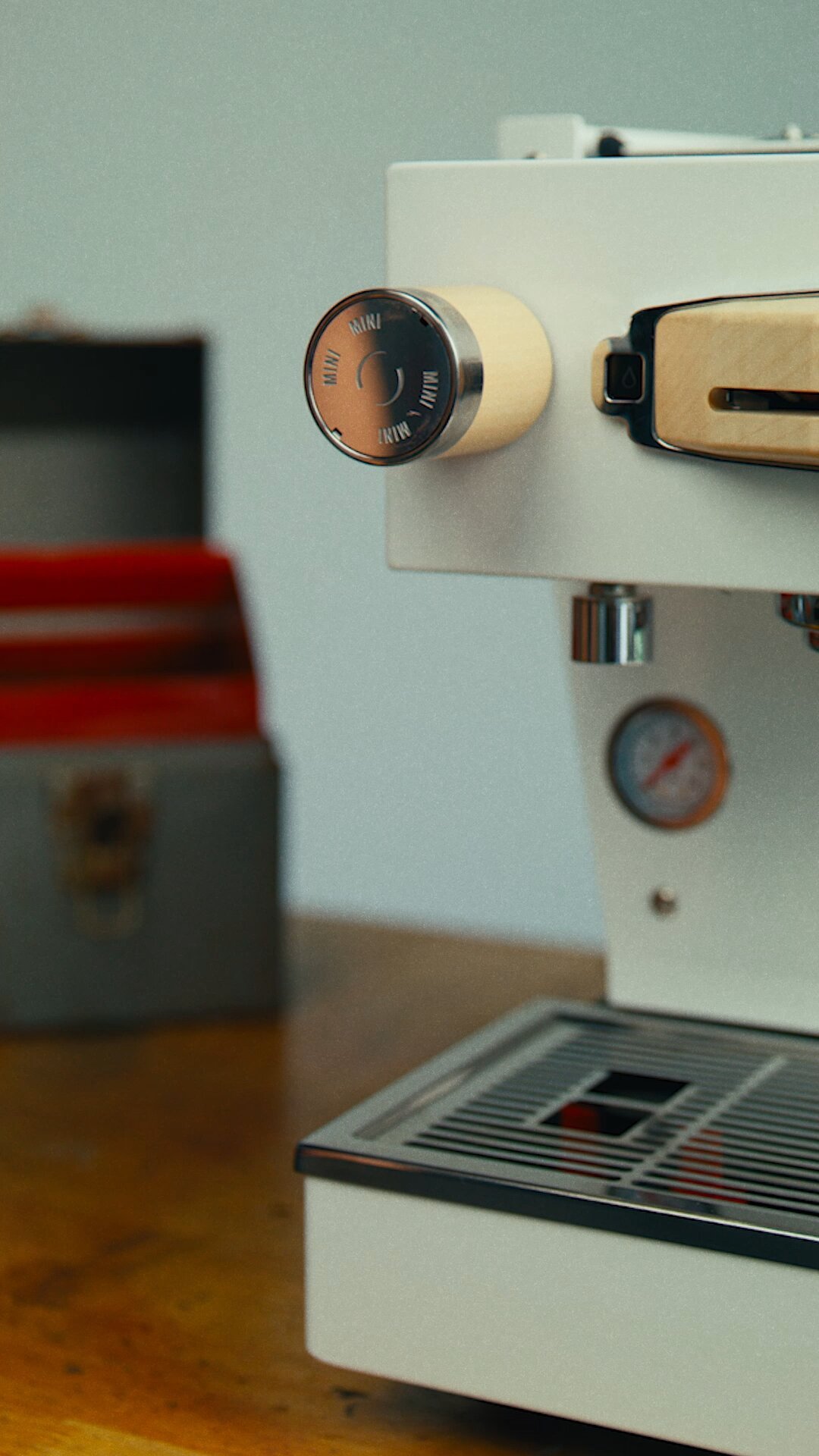 La Marzocco Linea Mini espresso machine detail shot showing group head and control knob
