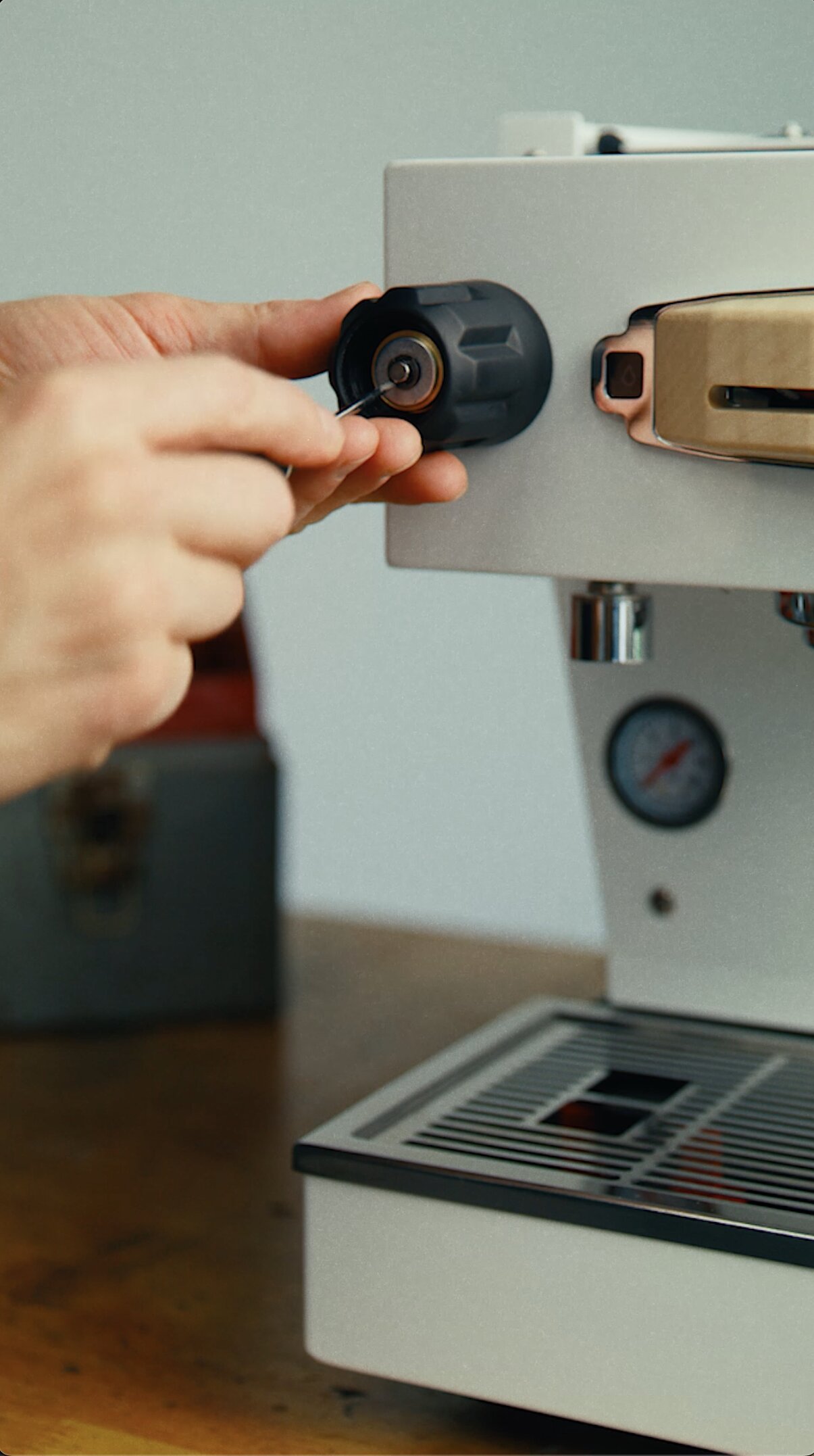 Adjusting group head on a La Marzocco espresso machine